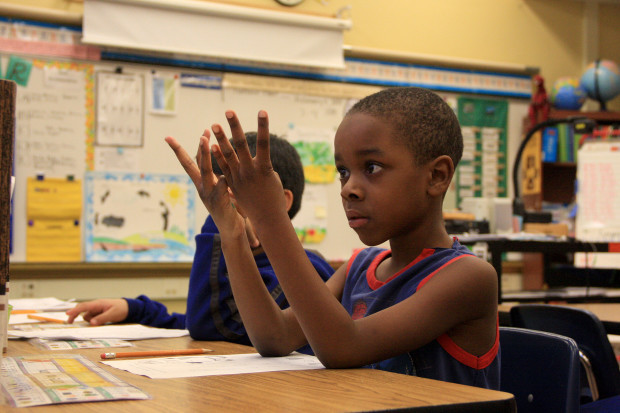 A first-grade student at Earl Boyles Elementary School in Portland, Oregon, learns math. 
